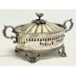 A Victorian ornate pierced silver plated butter dish with green opaline glass. 21x11x11cm