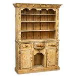 A Victorian pine kitchen dresser. 142x41x199cm