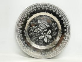 A Wedgwood Etruria tonquin silver lustre plate. 27cm