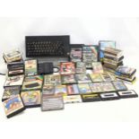 A vintage Sinclair ZX Spectrum Plus keyboard with games, etc.