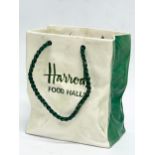 A Sylvac Ceramics Harrods Food Halls pottery bag. 9x6x10cm