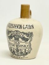 A Mitchell’s Old Irish Whisky ‘Cruiskeen Lawn’ Belfast flagon. H. Kennedy Glasgow. 14x20.5cm