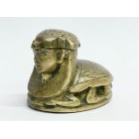 A Victorian brass Egyptian Revival inkwell. 7.5x5cm