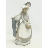 A large Nao figurine ‘Couple Courting’ 29.5cm