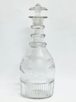 An Irish Regency period small etched crystal decanter and stopper. Circa 1800-1810. 22cm