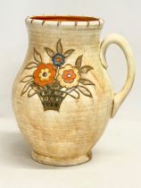 A large Charlotte Rhead vase with handle. Designed for Crown Ducal. 22x26cm
