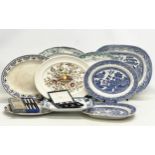 A collection of 19th and early 20th century platters and cutlery.