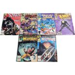A collection of 1980s Marvel Universe comic books including X-Men, Wolverine, The New Mutants,