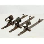 3 large 19th century iron wall hanging candleholders. 64cm