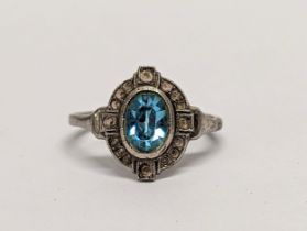 An ornate silver ring