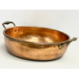 A large Victorian copper 2 handled jam pan. 55x44x16cm