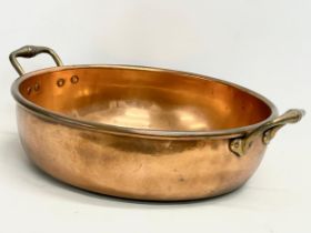 A large Victorian copper 2 handled jam pan. 55x44x16cm