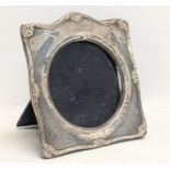 An ornate silver photo frame. Birmingham, 1932. 14x15cm