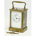 A good quality late 19th century Kands brass carriage clock with key. France. 9.5x8.5x18cm including