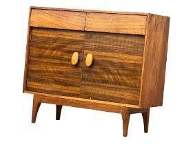 A 1950's Mid Century afromosia side cabinet. 91x36x81.5cm