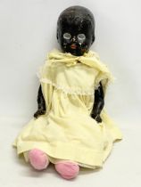 A vintage doll. 60cm