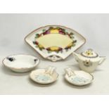 A collection of Charlotte Rhead pottery. Sugar bowl with lid 16x11cm. Serving tray 29.5x18cm