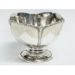 An E.S.Barnsley & Co sterling silver Art Nouveau footed bowl with rams head decoration.