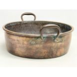 A large Victorian copper 2 handled jam pan. 47x40x19cm