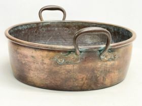 A large Victorian copper 2 handled jam pan. 47x40x19cm