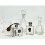 A collection of early 20th century perfume and vanity bottles.