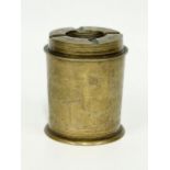 A vintage brass tobacco jar and ashtray. 10cm