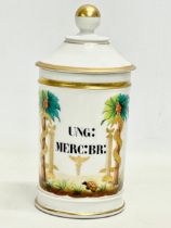 A 19th century French porcelain Apothecary jar and lid. 20.5cm