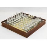 A glass chess set and board