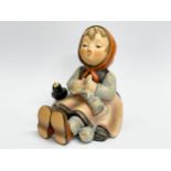 A Goebel pottery ‘Happy Pastime’ figurine. No.69. 8.5x9.5cm