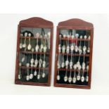 A pair of mahogany framed wall hanging display cabinets with collectors spoons. 26x49cm