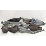 A quantity of vintage decoys.