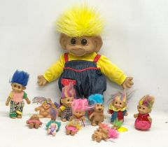 A collection of Russ Troll dolls. Largest 44cm