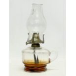An Edwardian glass finger oil lamp. 15x27cm