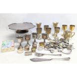 A quantity of silver plate, including cutlery, drinking goblets, napkin rings, etc.