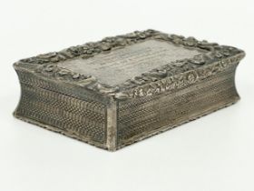 A George IV ornate sterling silver snuff box with gilded interior. Birmingham. 8.5x5.5x3cm