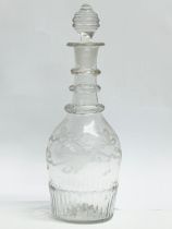 An Irish Regency period small etched crystal decanters and stopper. Circa 1800-1810. 21cm