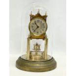 A BHA brass 400 Day Anniversary clock with glass dome. 30cm