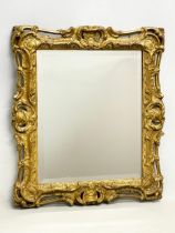 A Victorian gilt framed mirror 51.5x59cm