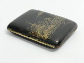 An early 20th century Japanese Komai damascened cigarette case, depicting Mount Fuji. 6.5x8cm
