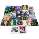 A collection of vintage vinyl records/LPs, including Johnny Cash, Dolly Parton, John Denver, etc