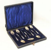 A set of ornate silver apostle spoons, Birmingham.