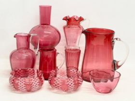 A collection of Victorian Cranberry and Ruby Glass. Largest Ruby Glass jug measures 18x18cm. A