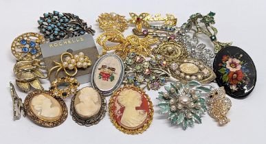 A collection of ornate brooches