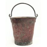 A vintage fire bucket stamped 1942. 45cm