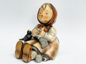 A 1930’s Goebel pottery ‘Happy Pastime’ figurine. No.69. 8.5x9.5cm.