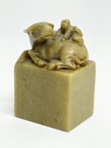 A 19th century Chinese jade figure. 5x4x8cm