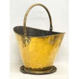 A Victorian brass coal bucket. 43x50cm