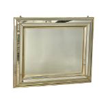 A large ornate bevelled mirror. 106x86cm