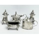 A 5 piece sterling silver condiment set.