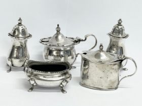 A 5 piece sterling silver condiment set.